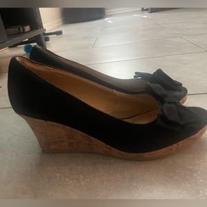 Black and brown wedged heels